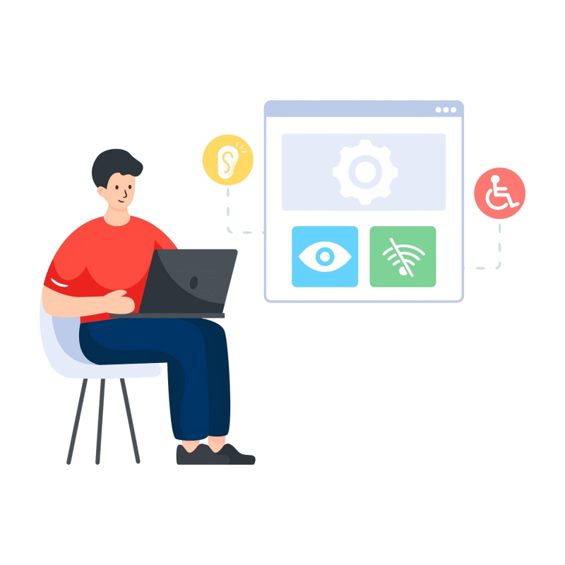 a man sitting in a chair using a laptop